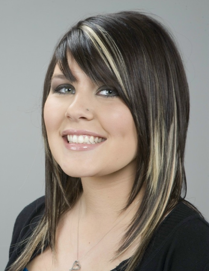 Dark hair with blonde highlights after a salon color service
